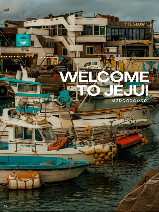 Harbor scene with boats and buildings, featuring text 'Welcome to Jeju!'.