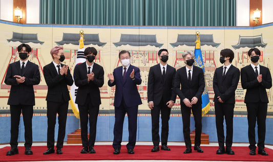 BTS members V J-Hope Jin RM Suga Jimin Jungkook with President Moon Jae-in receiving Special Presidential Envoy appointment certificates Cheong Wa Dae September 14 2021