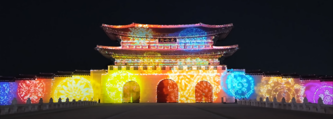 Seoul Christmas illumination at Gwanghwamun Square with large-scale media art projection lighting up the historic gate during Korea's holiday season
