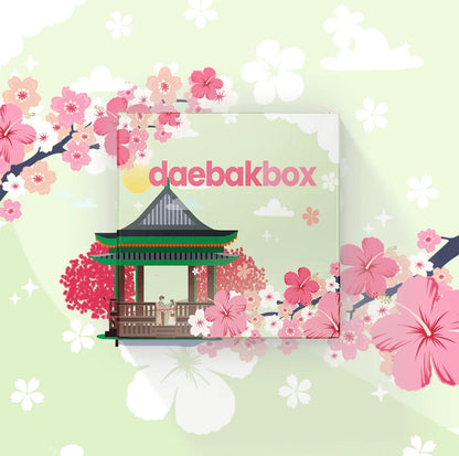 Daebak Spring Box featuring a curated selection of Korean beauty, fashion, snacks, and lifestyle items in bright, seasonal packaging.
