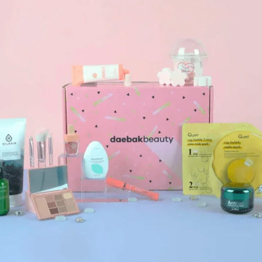 daebak Beauty Box featuring a curated selection of Korean skincare and makeup products from top K-beauty brands in vibrant packaging.
