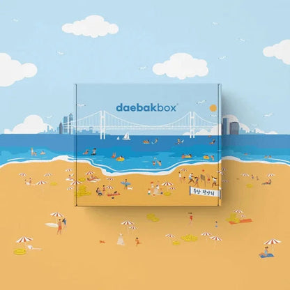 Daebak Summer Box filled with Korean skincare, makeup, snacks, and lifestyle items in vibrant, summer-themed packaging.