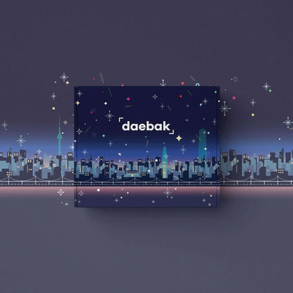 Daebak Winter Box showcasing Korean skincare, cozy fashion accessories, festive snacks, and limited edition winter-themed items in seasonal packaging.