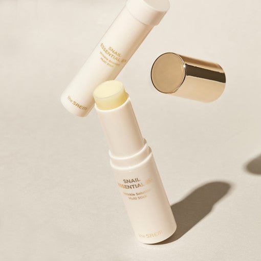 The SAEM Snail Essential EX Wrinkle Solution Multi Stick 10.5g - Daebak